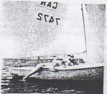 Albacore CAN 7472 with a crew member hiking out straight-legged over the side
