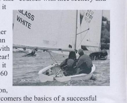 Two sailors racing an Albacore marked GLASS WHITE