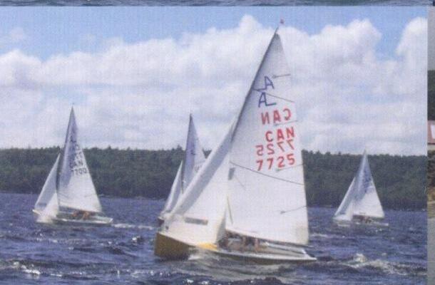 Albacores sailing with sail number CAN 7725 in the foreground