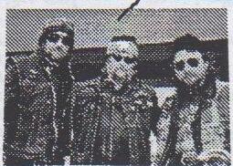 Three people in sunglasses wearing CAA jackets