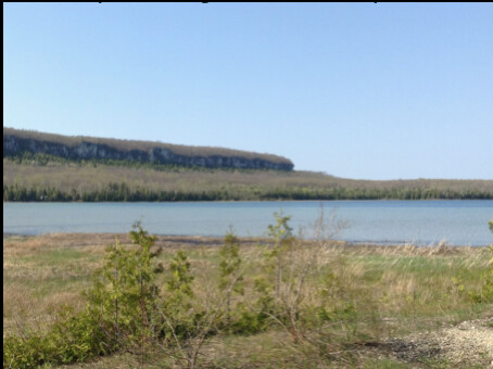 Cape Croker escarpment seen across the water from the reserved campsites