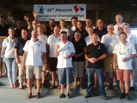 Group photo of Internationals participants under a 23rd Albacore International Championships banner
