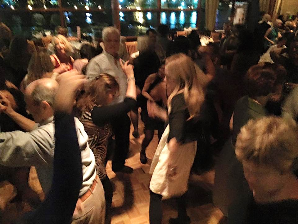 Sailors dancing at a regatta social