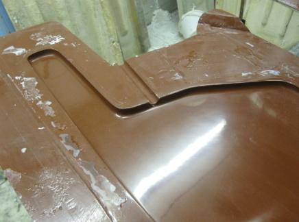 Close-up of a brown fibreglass centerboard mould