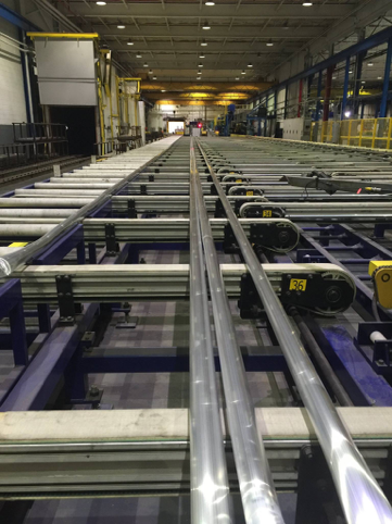 Figure 2: Initial run of HAPCO Albacore mast section, hot from the extrusion press