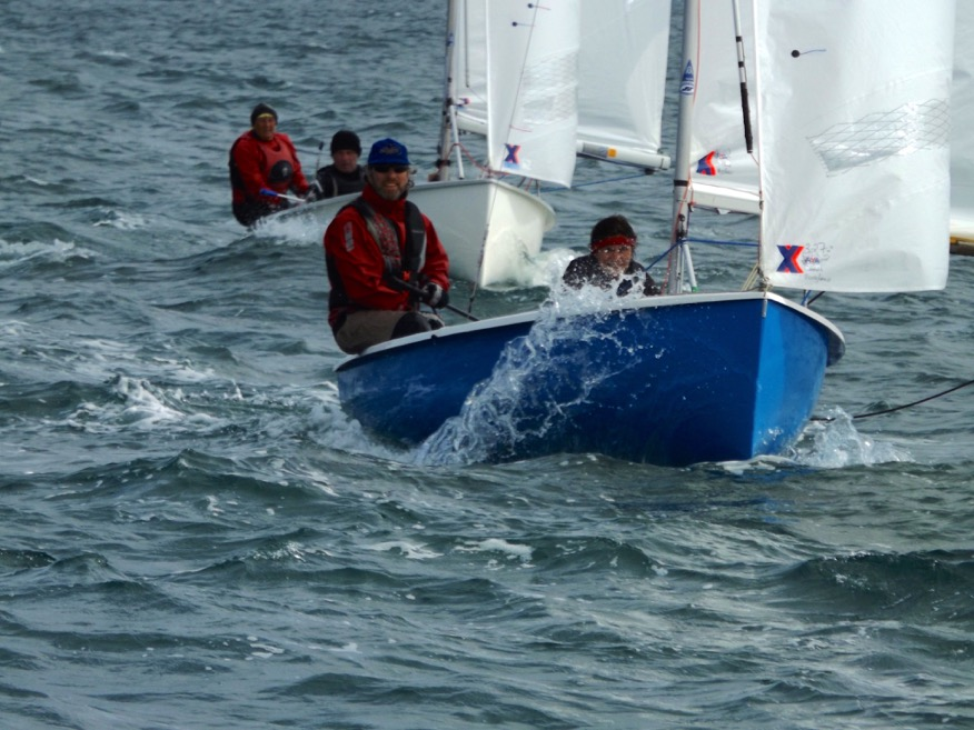 Two Albacores racing, splashing through waves