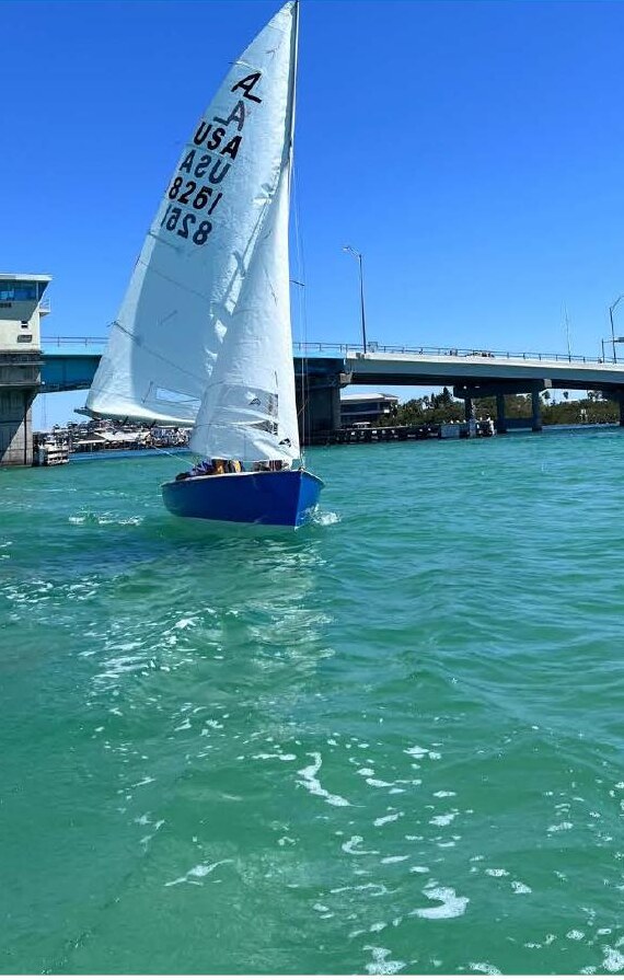 Albacore sailing under a bridge in Sarasota