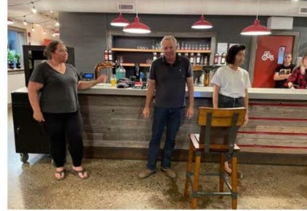 Mabel, Ralph and Stephanie hosting games night at the bar