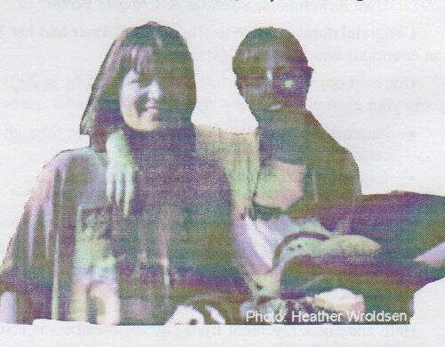Leslie McShane and Marg Vaillancourt sitting together, smiling