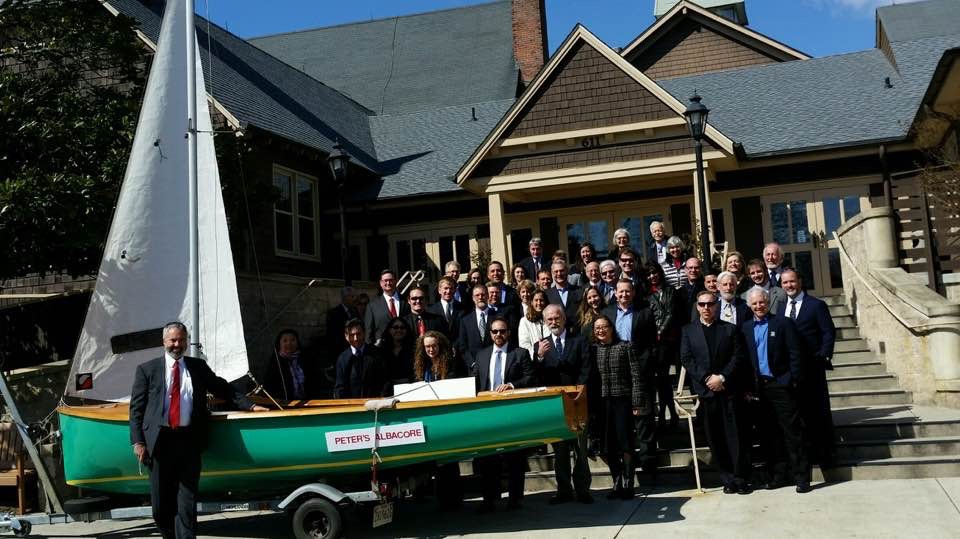 Memorial gathering with Peter's green Albacore on its trailer