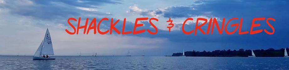 Shackles & Cringles banner over a sunset sail