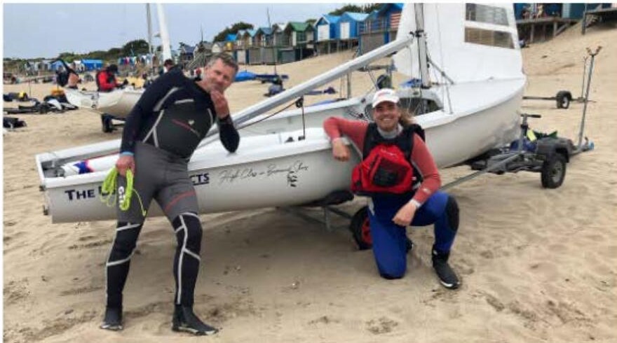 Guy Tipton and Henry Pedro on the beach at Abersoch