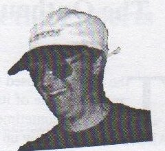 Head-and-shoulders portrait of Bob Stiff in a white baseball cap and sunglasses