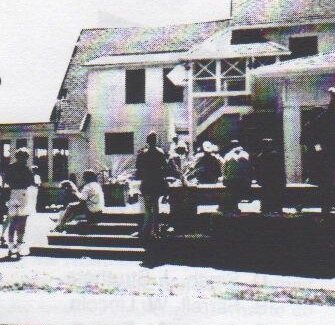 Sailors gathered on the steps of the Buffalo Canoe Club clubhouse