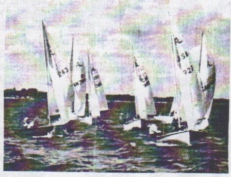 A pack of Albacores sailing close together on Abino Bay