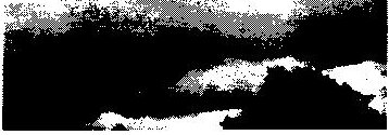 Fig. 2B: a dark band of stratocumulus cloud low on the horizon