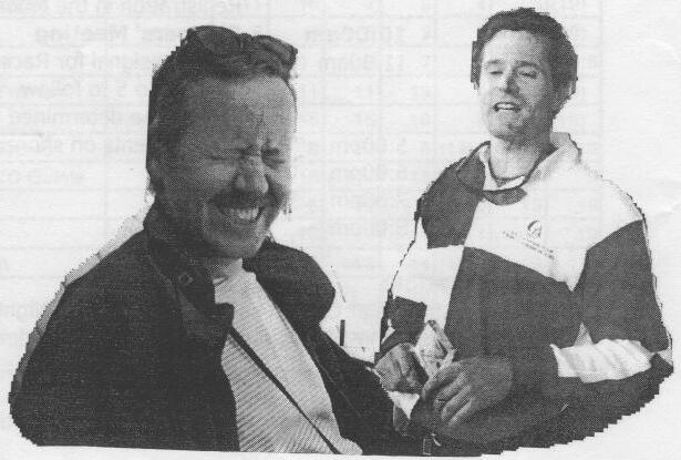 Dave Harris laughing with his eyes squeezed shut beside a grinning Kevin Smith