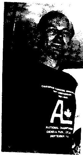 Tim Broughton wearing a Canadian Albacore Association national championship T-shirt