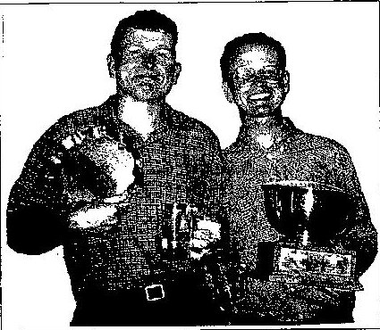 First place winners Duncan Glen and Alistair Glen holding their trophies