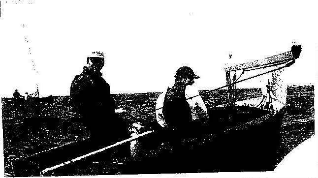 Duncan Glen at the helm and Alistair Glen sailing their Albacore in relaxed mode