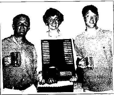 Third place winners Martin Cockram and Colin Smith with Daphne Byron presenting the USAA President’s Trophy