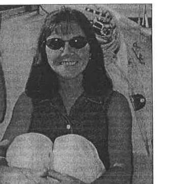 Commodore Heather Macnaughton in sunglasses
