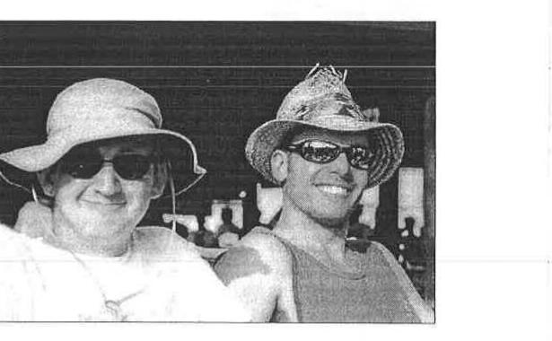 Two sailors in sun hats and sunglasses at the Midwinters
