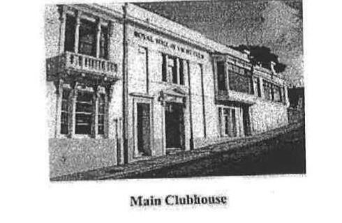 The Royal Torbay Yacht Club's Main Clubhouse, a white building with a balcony