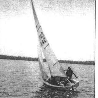 A Cabbagetown Youth Centre sailor at the helm of an Albacore
