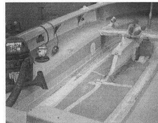 Grinding the gel coat away from the tank-to-floor joint