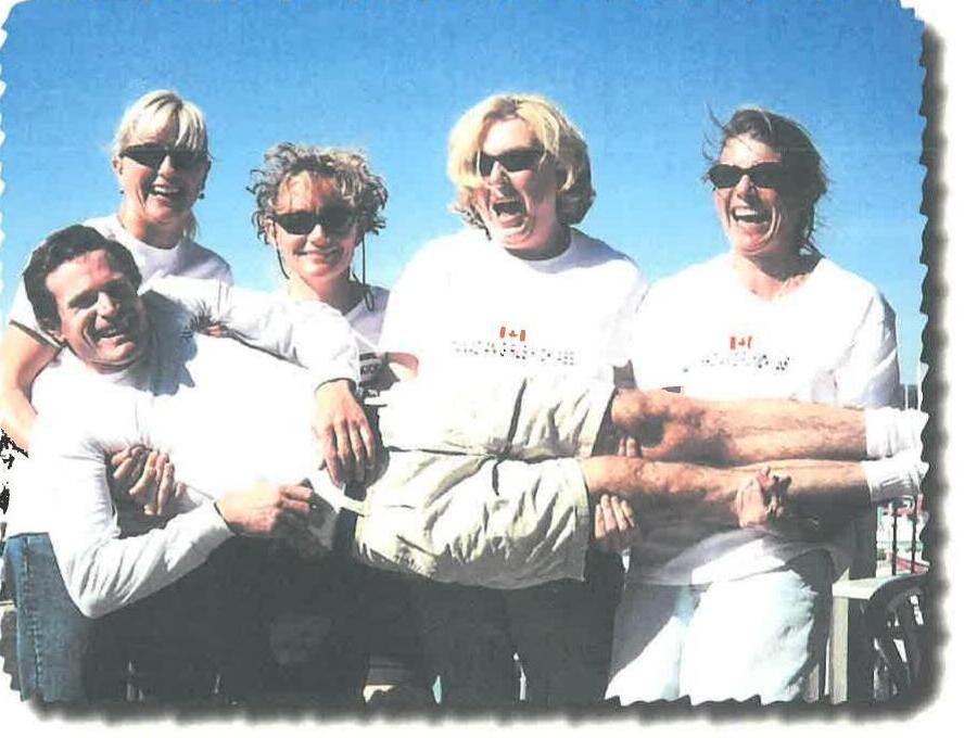 Five sailors laughing together outdoors, a man holding up two others' linked arms, under the caption “Here’s the BEEF!!!”