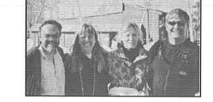 Four sailors from the clinic posed together outdoors, smiling