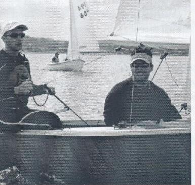 Skipper and crew aboard the Albacore, another boat visible behind them on the water