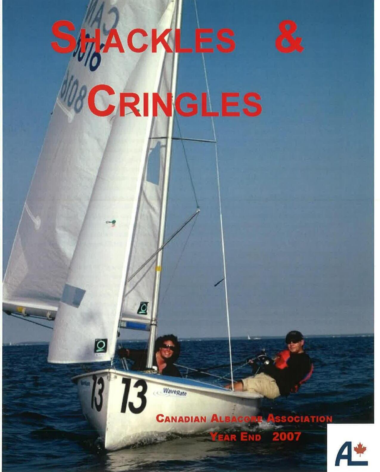 Two sailors hiking out on Albacore 13 under full sail, close to the camera with a WaveRate boat cover