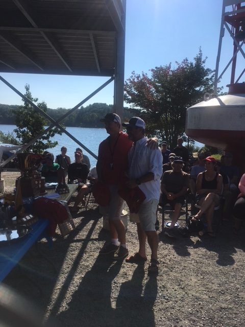 Chris Cook and Jeff Beitz holding the 3rd place trophy at the 2018 Canadians Regatta