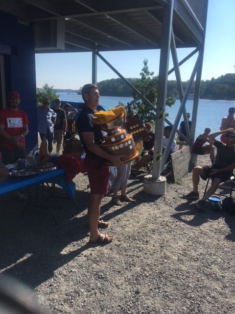 George Carter and Robbin Coedy holding the 1st place trophy at the 2018 Canadians Regatta