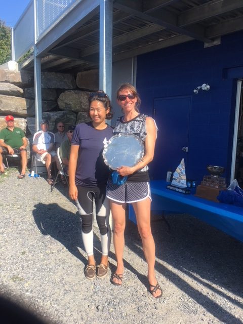 Liana Giovando and Mabel Chan holding the Ladies Helm trophy at the 2018 Canadians Regatta